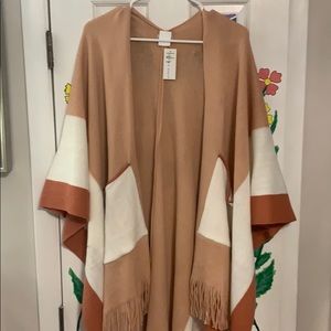 Pink poncho by harvé benard